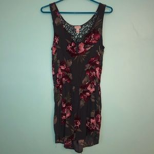 Green pink and purple floral romper